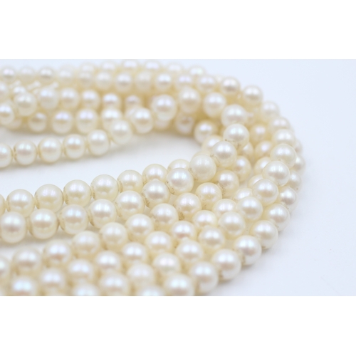 190 - 9ct gold cultured pearl three strand necklace (42.6g)