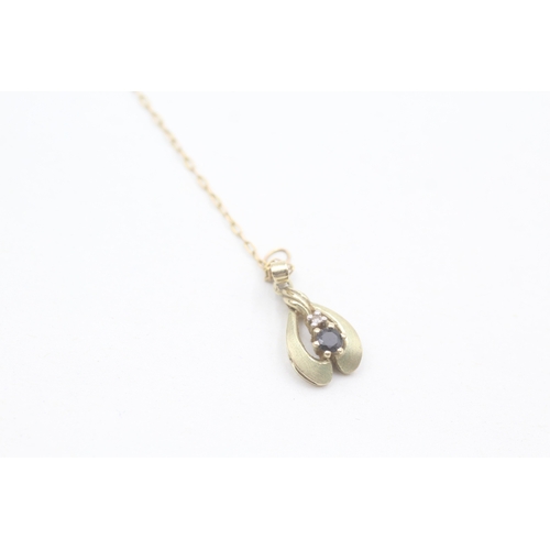 198 - 9ct gold vintage diamond and sapphire set pear shaped pendant necklace (2.3g)