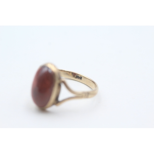 201 - 9ct gold garnet cabochon set cocktail ring (2.9g) Size  P