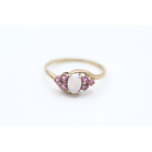 205 - 9ct gold ruby and opal set dress ring (1.5g) Size  P