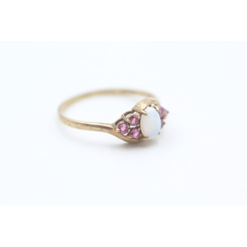 205 - 9ct gold ruby and opal set dress ring (1.5g) Size  P