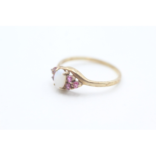 205 - 9ct gold ruby and opal set dress ring (1.5g) Size  P