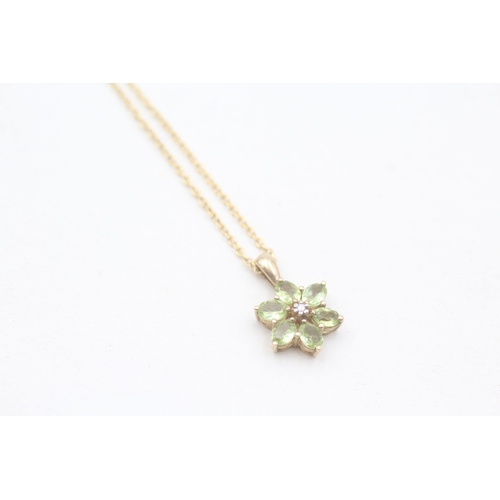 209 - 9ct gold peridot and diamond set floral cluster pendant necklace (2.3g)