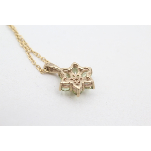 209 - 9ct gold peridot and diamond set floral cluster pendant necklace (2.3g)