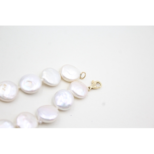 214 - 14ct gold cultured flat pearl single strand necklace (41.6g)