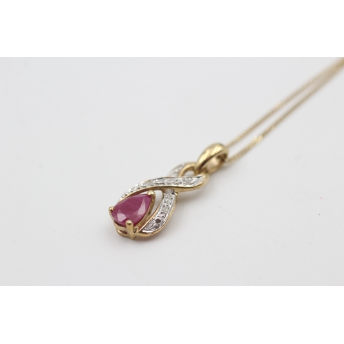 220 - 9ct gold diamond & ruby pendant necklace (1.6g)