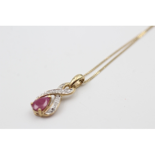 220 - 9ct gold diamond & ruby pendant necklace (1.6g)