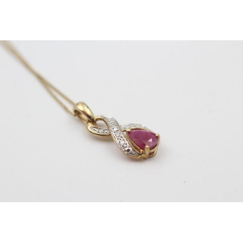 220 - 9ct gold diamond & ruby pendant necklace (1.6g)