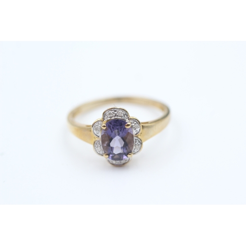 221 - 9ct gold amethyst single stone ring with diamond frame (2.3g) Size  P