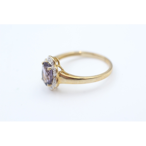 221 - 9ct gold amethyst single stone ring with diamond frame (2.3g) Size  P