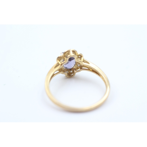 221 - 9ct gold amethyst single stone ring with diamond frame (2.3g) Size  P