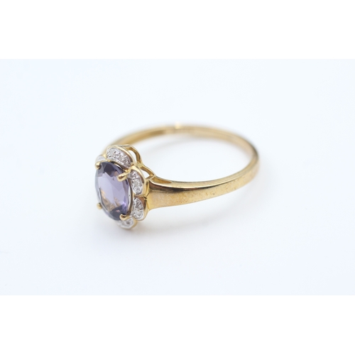 221 - 9ct gold amethyst single stone ring with diamond frame (2.3g) Size  P