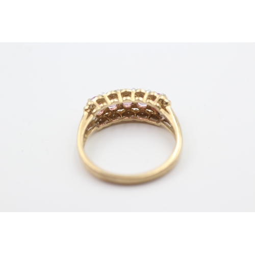 249 - 9ct gold pink sapphire five stone ring with diamond surround (2.6g) Size  N