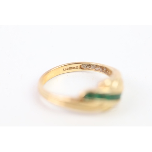 33 - 9ct gold channel set emerald knot ring (2.5g) Size  O