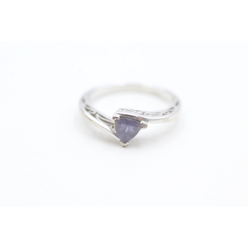 37 - 9ct white gold trilliant cut iolite dress ring (2.7g) Size  N