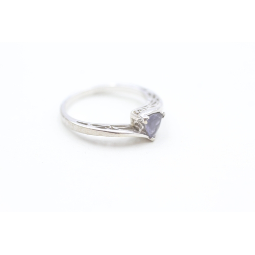 37 - 9ct white gold trilliant cut iolite dress ring (2.7g) Size  N