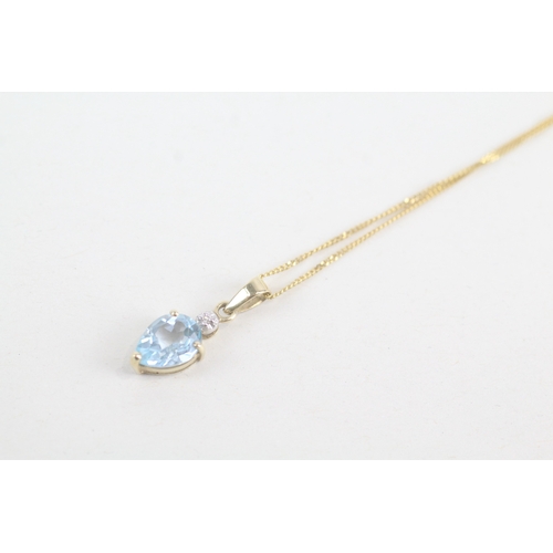 40 - 9ct gold diamond & topaz pendant necklace (1.4g)