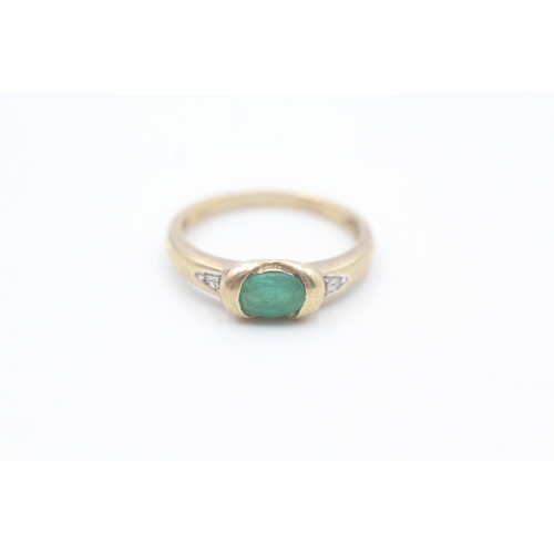 43 - 9ct gold emerald single stone ring with diamond set shoulders (1.9g) Size  L