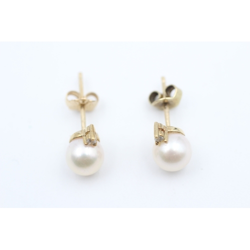 44 - 9ct gold diamond and cultured pearl set stud earrings (2g)