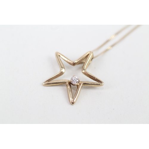 46 - 9ct gold diamond set cut out star pendant necklace (1.9g)