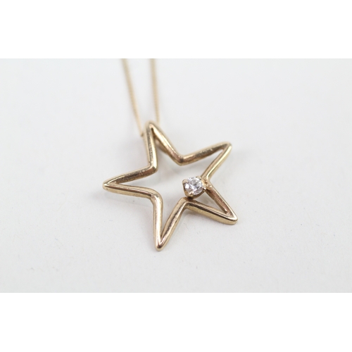 46 - 9ct gold diamond set cut out star pendant necklace (1.9g)