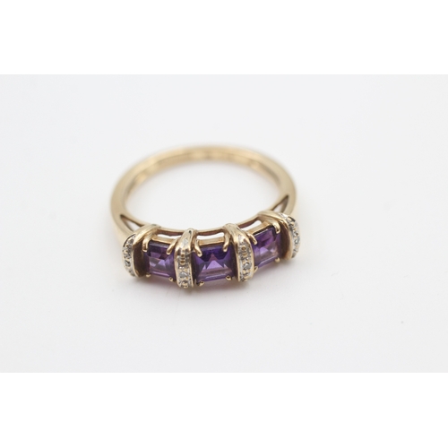 48 - 9ct gold amethyst three stone ring with diamond spacers (2.8g) Size  M