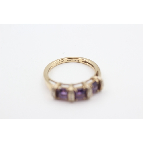 48 - 9ct gold amethyst three stone ring with diamond spacers (2.8g) Size  M