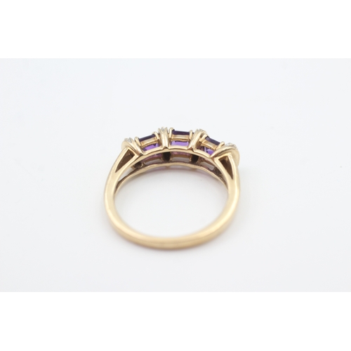 48 - 9ct gold amethyst three stone ring with diamond spacers (2.8g) Size  M