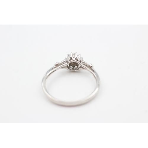 58 - 9ct white gold diamond cluster ring (1.6g) Size  P