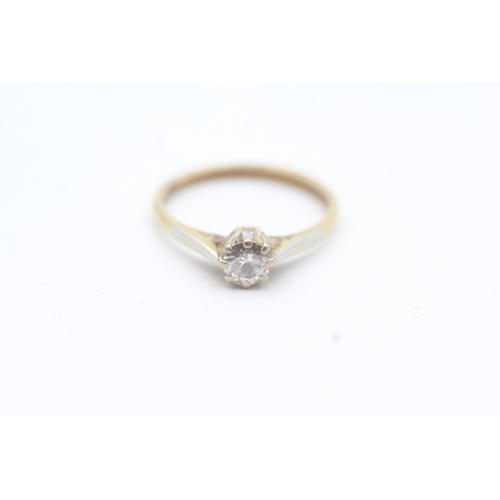 64 - 18ct gold round brilliant diamond single stone ring (2g) Size  L