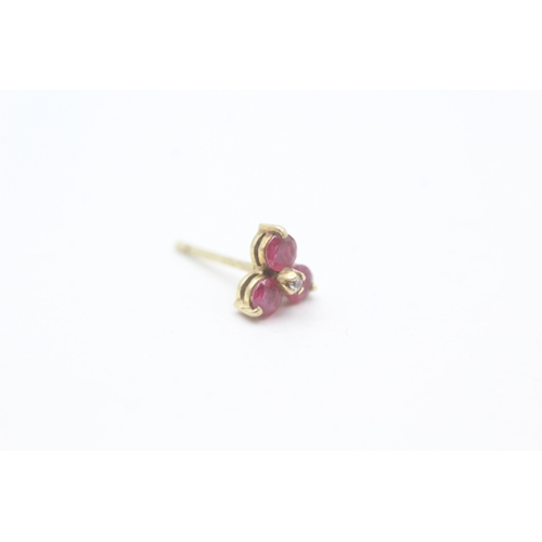 67 - 9ct gold ruby and diamond set floral stud earrings (1.3g)