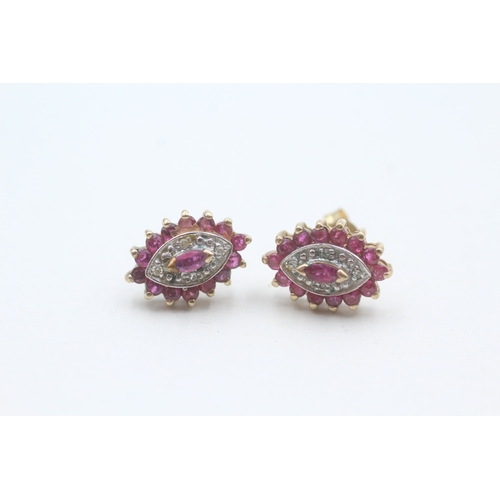 77 - 9ct gold ruby and diamond set marquise shaped stud earrings (2.3g)