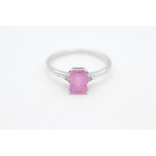 80 - 9ct white gold diamond accented pink gemstone set dress ring (2.1g) Size  R