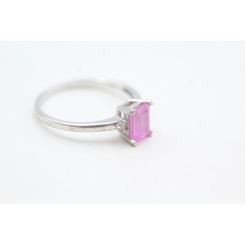 80 - 9ct white gold diamond accented pink gemstone set dress ring (2.1g) Size  R