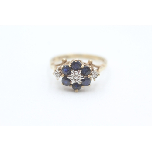 82 - 9ct gold diamond and sapphire set cluster ring (2.6g) Size  M