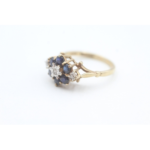 82 - 9ct gold diamond and sapphire set cluster ring (2.6g) Size  M