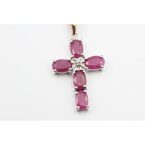 87 - 9ct gold diamond and ruby set cross pendant necklace (3.5g)