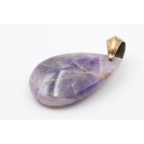 13 - 9ct gold bail amethyst teardrop pendant (15.8g)