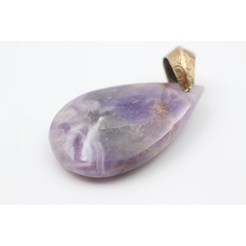 13 - 9ct gold bail amethyst teardrop pendant (15.8g)