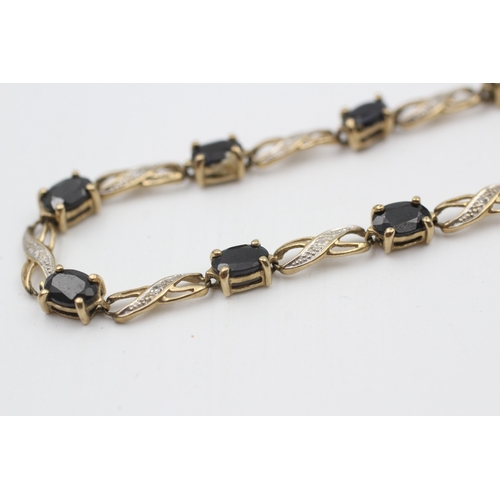 23 - 9ct gold diamond & sapphire fancy link bracelet (6.3g)