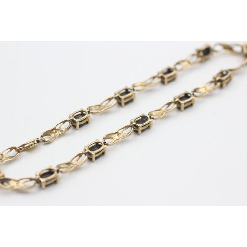 23 - 9ct gold diamond & sapphire fancy link bracelet (6.3g)