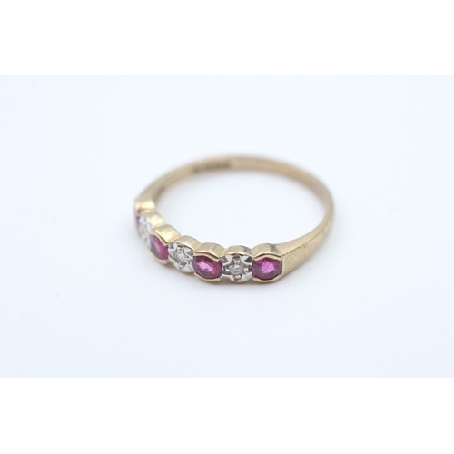 27 - 9ct gold ruby and diamond set seven stone eternity ring (1.7g) Size  O