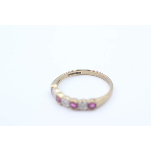 27 - 9ct gold ruby and diamond set seven stone eternity ring (1.7g) Size  O