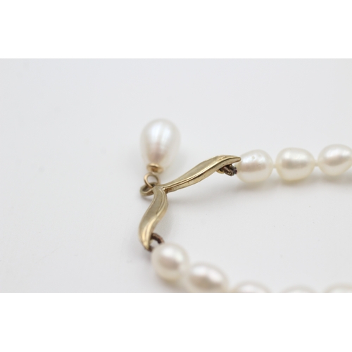 37 - 9ct gold cultured pearl necklace (10.6g)