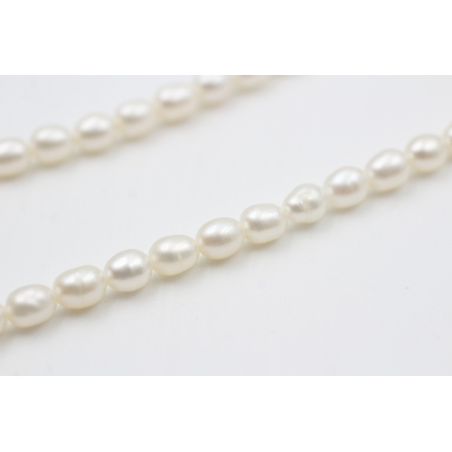 37 - 9ct gold cultured pearl necklace (10.6g)