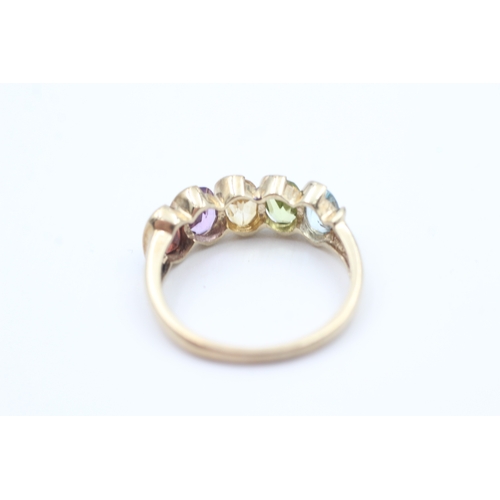 49 - 9ct gold garnet, amethyst, Citrine, peridot and blue topaz set five stone eternity ring (2.6g) Size ... 