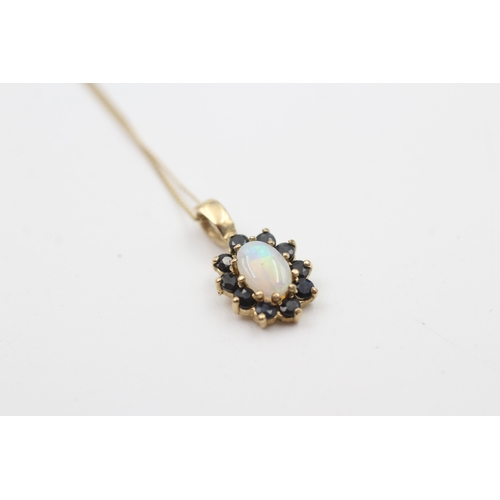 51 - 9ct gold opal and sapphire cluster pendant necklace (1g)