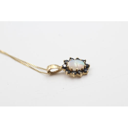 51 - 9ct gold opal and sapphire cluster pendant necklace (1g)