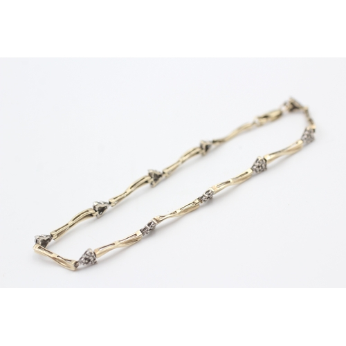 55 - 10kt gold diamond accented fancy link bracelet (4.1g)