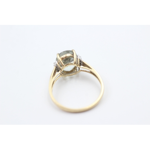 56 - 9ct gold prasiolite single stone ring with diamond sides (2.3g) Size  Q